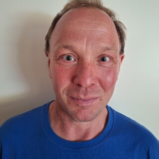 Urmas Simus Credential Photo